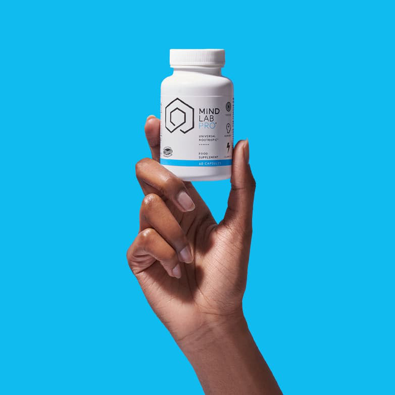 image of hand holding a Mind Lab Pro® bottle